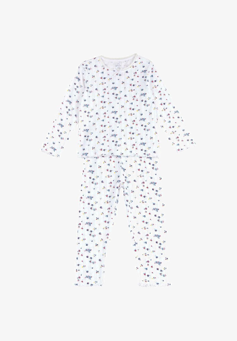 Ensemble de pyjama en coton blanc comprenant un haut à manches longues et un pantalon, avec un motif floral et une texture côtelée. Encolure bordée et poignets à volants.
