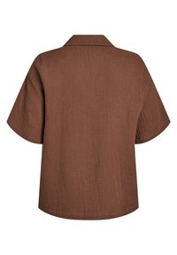 Brown short-sleeve shirt featuring a textured fabric, collared neckline, and loose fit, with a straight hem and minimal design details.
