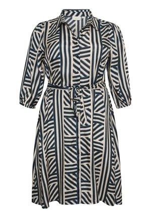 Beige värvi nupuga särk-kleit, millel on julged sinised ja mustad triibud, pikad varrukad ja vöödiga talje, et luua näoväline ilme.