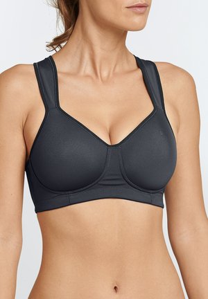 Schwarzer Sport-BH aus glattem Stoff, mit breiten Trägern, V-Ausschnitt und genähten Cups für Halt und Struktur.