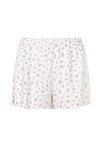 Witte shorts met elastische tailleband, voorzien van een klein roze bloemenpatroon en een golvende rand.