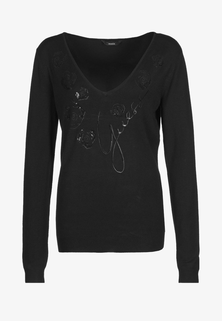 Pull en maille noir avec un col en V, décoré de roses en sequins et du nom de la marque "Guess" en design cursif. Manches longues et coupe ajustée.