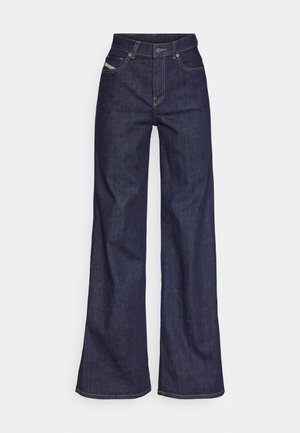 Jeans ample bleu foncé en denim avec taille haute, ornés de surpiqûres orange, d'un design à cinq poches et d'une fermeture à bouton.