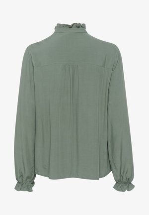 Langärmlige Bluse aus weichem olivgrünem Stoff. Verfügt über einen Rüschensaum, Falten im Rückenbereich und elastische Bündchen. Glatte Textur, lässige Passform.