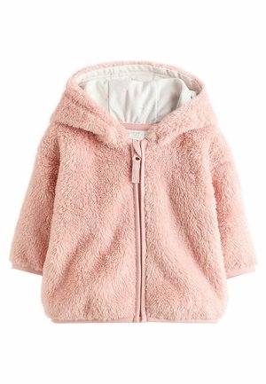 Flockig rosa jacka med huva, framdragkedja och mjuk textur. Insidan är fodrad med ett ljusare tyg som har små, subtila prickar.