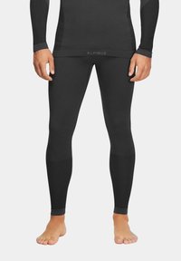 Czarne legginsy sportowe wykonane z elastycznego materiału, z dopasowanym krojem, prążkowym detalem na łydkach oraz logo na pasku.