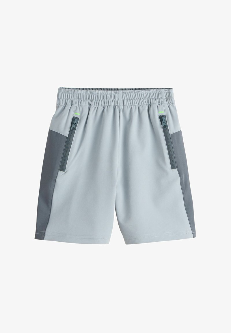 Shorts de sport gris clair avec des panneaux latéraux gris foncé, taille élastique et poches zippées des deux côtés.