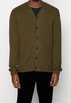 Olive green cardigan made from a soft knit, featuring a V-neck, long sleeves, and six brown buttons down the front.