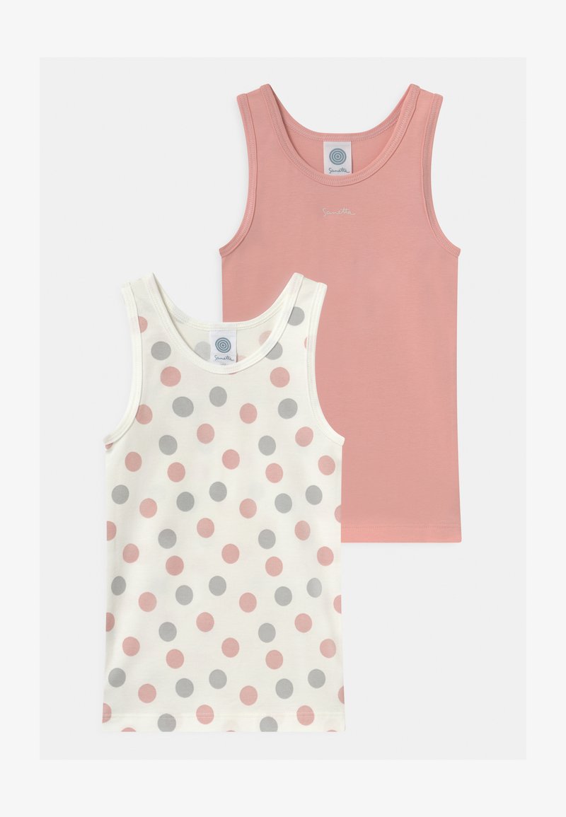 Two tank tops: one solid light pink, the other white with gray and pink polka dots. Both feature wide straps and a classic fit.