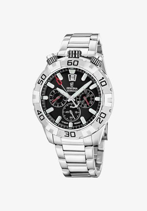 Strieborné chronografické hodinky Festina s čiernym ciferníkom, tromi malými ciferníkmi, okienkom na dátum o 12. hodine a očíslovaným lunetovým rámom na náramku z kovových článkov.