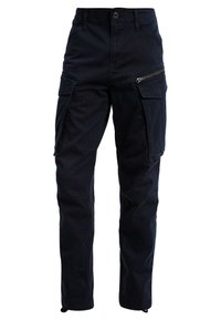 Czarne spodnie cargo z zamykaną na zamek kieszenią, o kroju prostych nogawek i licznymi bocznymi kieszeniami. Wykonane z wytrzymałej tkaniny.