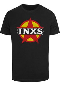 Sorte bomulds T-shirt med et rødt og gult stjernelogo og "INXS" i fed hvid skrift på tværs af midten. Klassisk crew neck-design.