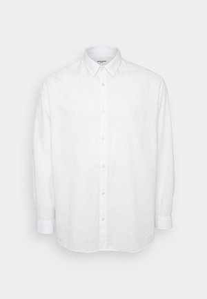 Chemise blanche à manches longues en lin léger, avec un col à bouton, des boutons sur le devant et une coupe décontractée avec des manches à poignet.