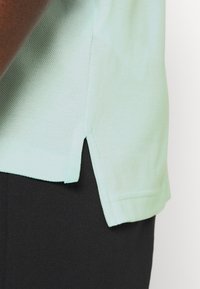 Tommy Hilfiger REGULAR - Polo - oxygen