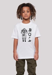White t-shirt with a black astronaut suit graphic and space gear illustrations. Features short sleeves and a classic crew neckline.