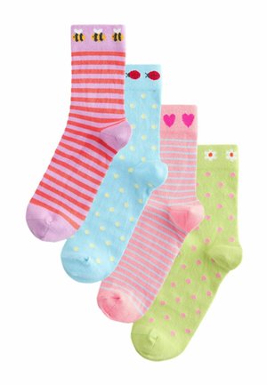 Štyri farebné ponožky s motívmi: včely na ružovo-oranžových pruhovaných, čerešne na modrom s žltými bodkami, srdcia na ružových pruhovaných a margarétky na zelenej s ružovými bodkami.