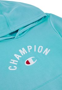 Felpa con cappuccio turchese, con ricamo e logo bianco "CHAMPION". Tessuto morbido, tasca a marsupio, vestibilità comoda e dettagli cuciti.