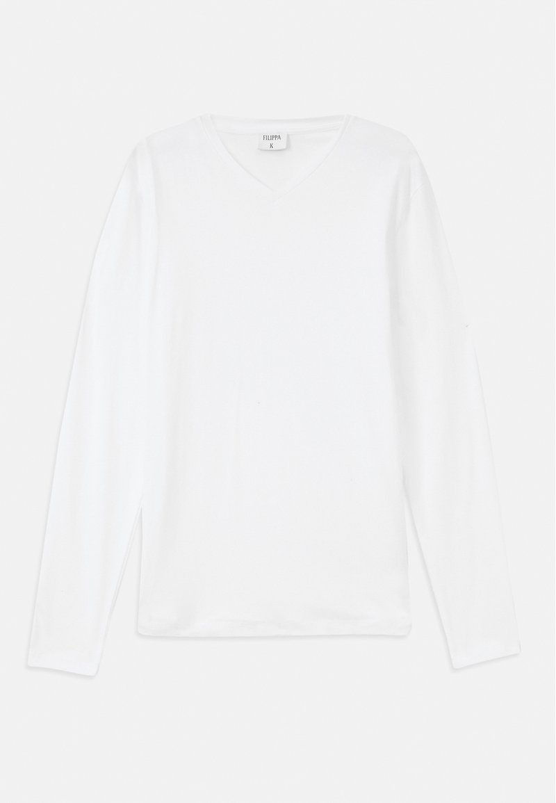 Camiseta blanca de manga larga con cuello en V, hecha de material suave, que presenta un corte holgado y aberturas laterales para mayor comodidad.