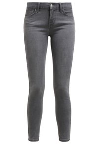 Vaqueros ajustados grises de denim elástico, con un diseño de cinco bolsillos, cierre de botón y piernas estrechas para un ajuste slim.