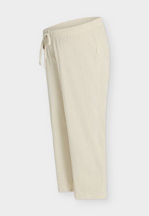 Heledad beeži tekstuuriga paeltega püksid, millel on lõdvestunud istuvus ja sirged sääred, esitletud ühevärvilise tausta ees.