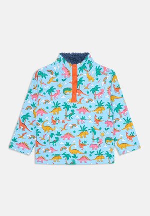 Jersey azul de manga larga con tapeta de botones naranja. Presenta un estampado de dinosaurios y palmeras en rosa, amarillo y verde. Cuello esponjoso.