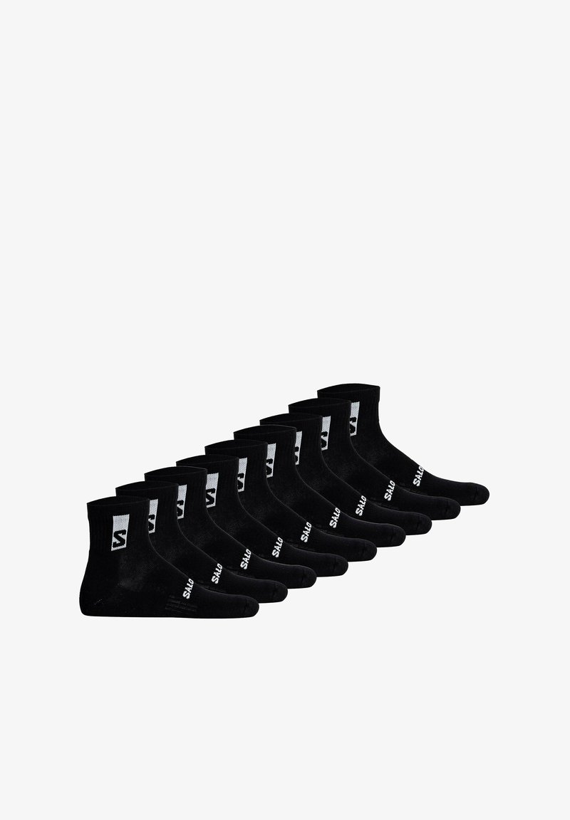 Sorte ankelstrømper i en pakke med ti, med ribbet tekstur, forstærket hæl og hvidt logo-detail på ydersiden.