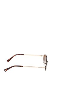 Solbriller med mørke ovale linser, gyldne metalrammer og acetat-beslag med skildpadde-mønster, der har en gylden stjerneaccent.