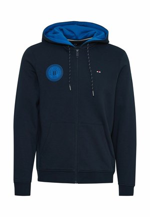 Námornícky zipsový sveter s modrou vnútornou kapucňou, predným logom, akcentmi na šnúrkach a dvoma prednými vreckami. Obsahuje rebrované manžety a lem.
