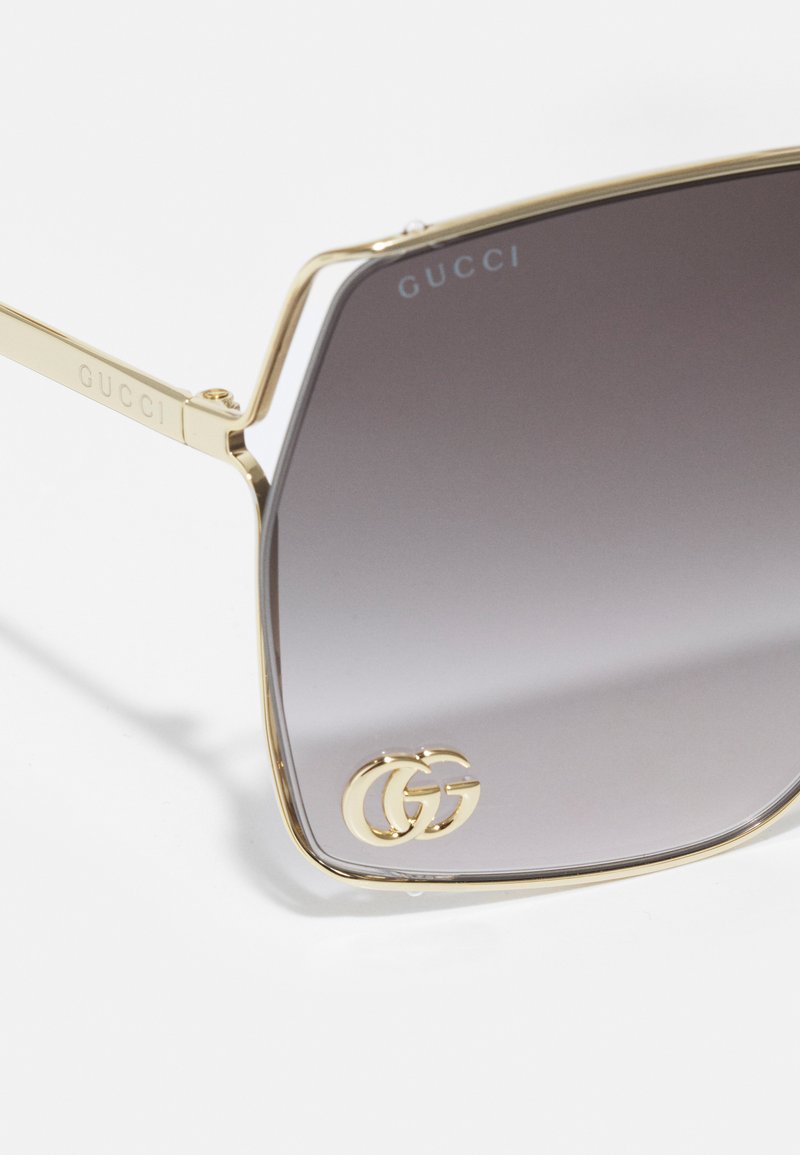 gucci gold metal sunglasses