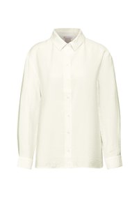 Camicia bianca a maniche lunghe con colletto alla francese, tessuto leggermente strutturato, vestibilità dritta e chiusura a bottoni sul davanti.