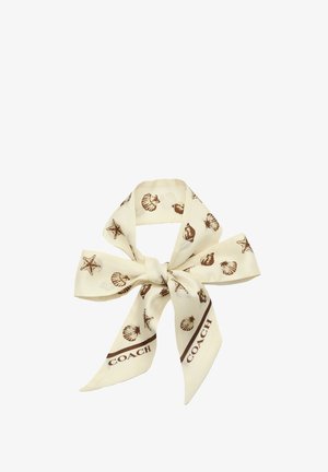 Ivory satin scarf with a glossy texture, featuring brown shell and starfish patterns, tied in a bow with visible branding at the center.