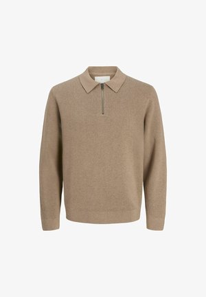 Pull-over en tricot beige à manches longues avec un col et une courte fermeture éclair à l'avant, présenté sur un fond blanc.