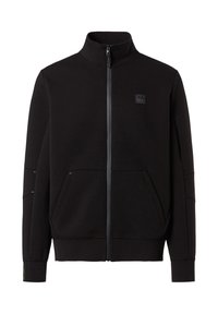 Felpa nera con zip realizzata in tessuto morbido. Presenta un colletto alto, due tasche frontali e una piccola etichetta con logo sul lato sinistro del petto.