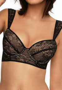Black lace bralette featuring a deep V design, adjustable straps, and floral patterns, with a smooth fabric lining for comfort.