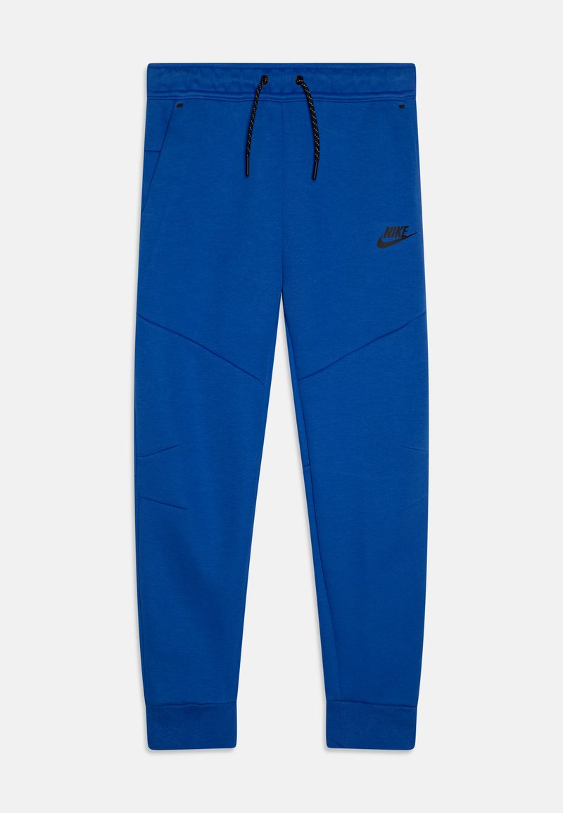 Blaue Jogginghose mit elastischem Bund und schwarzem Kordelzug. Mit Nike-Logo in schwarz und strukturierten diagonalen Mustern auf dem Stoff.