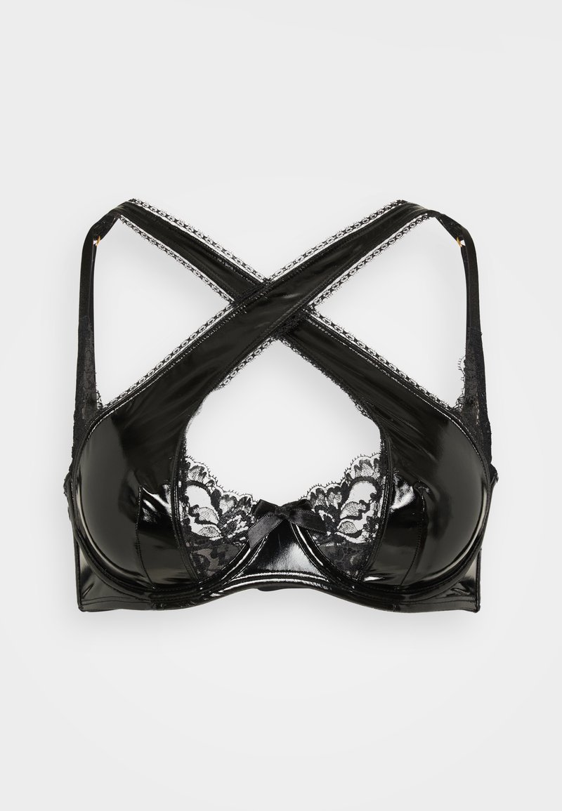 Black bra featuring a glossy patent finish, lace trim along the cups and straps, and X-back design with a small bow detail at the center.