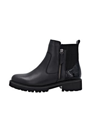 Bottines noires avec un devant en cuir lisse, un dos en tissu côtelé, une fermeture éclair sur le côté et un panneau d'accent texturé, dotées d'une semelle plate solide.
