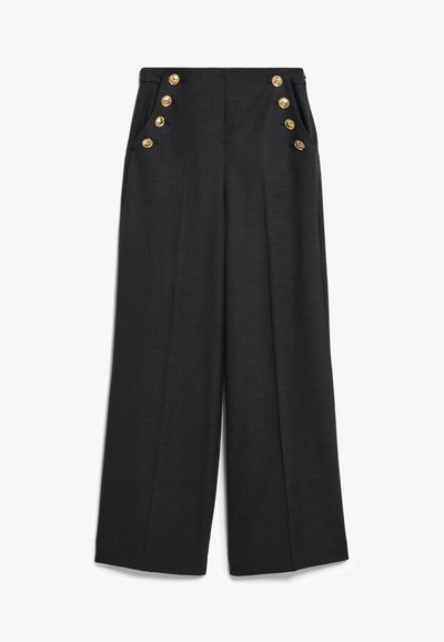 Wide-leg black trousers made of textured fabric featuring gold decorative buttons on the front and side pockets.