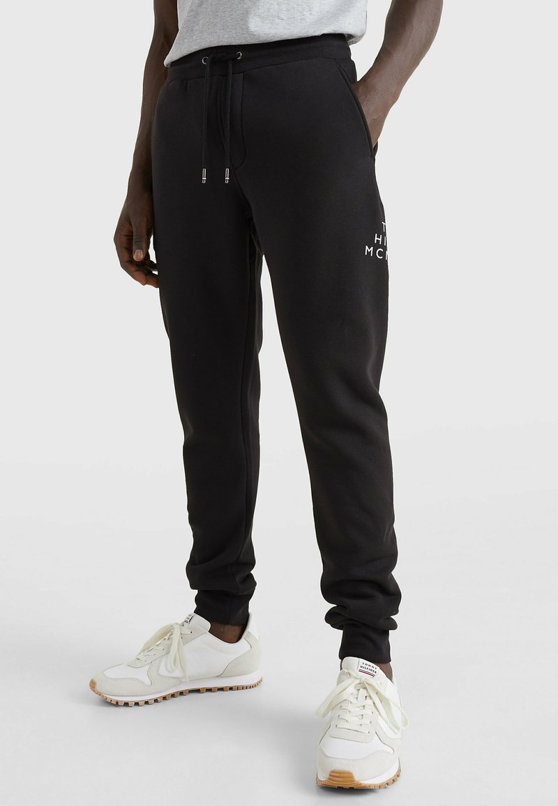Tommy Hilfiger Tracksuit bottoms black Zalando.de