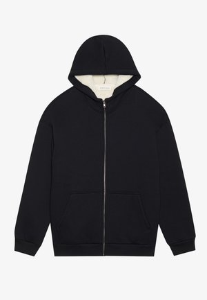Černá mikina na zip s jemným fleecovým podšívkou v krémové barvě. Má kapuci, přední kapsy a žebrované manžety. Jednoduchý design.