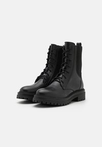 Geox IRIDEA - Stivaletti con plateau - black
