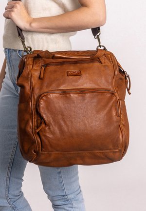Brown leather handbag with a textured finish, featuring multiple zippered pockets and a detachable strap. Rectangular shape with a sturdy design.