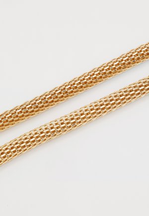 Gouden metalen gaasbuisjes met een afgeronde vorm, met een geweven textuur en glinsterende afwerking. Twee buisjes worden naast elkaar weergegeven.