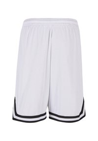 Hvide sports shorts med sorte stregsider, elastisk taljebånd og en glat, let tekstur. Kort længde og let indsnævret design.