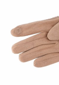 Guanti beige realizzati in materiale morbido con una superficie testurizzata. Le dita sono leggermente allungate con cuciture visibili e un ricamo decorativo sul pollice.