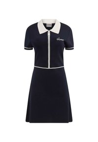 Laivastonsininen polo-mekko lyhyillä hihoilla ja valkoisella kauluksella. Ominaisuuksiin kuuluu täyspitkä vetoketju edessä, kontrastiväriset pipot yksityiskohdat ja logo-ompelu rinnassa.