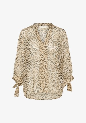 Viegls, caurspīdīgs blūze dzīvnieku rakstā. Iezīmes V veida kakla izgriezums, garas piedurknes ar sasaistes akcentiem un brīvs griezums. Krāsu palete ietver beiga un brūna toņus.