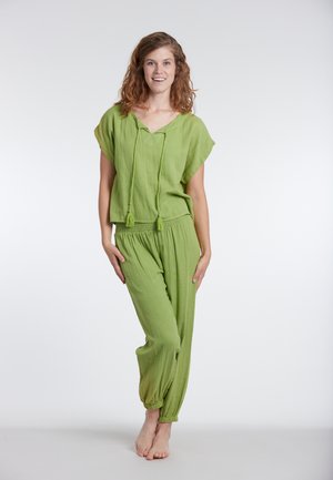 UNICOLOR - Stoffhose - grün