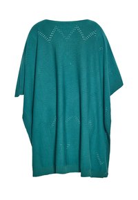 Poncho tricotat turcoaz, cu o croială lejeră, prevăzut cu un model perforat în zigzag și margini ondulate pentru textură și detaliu.