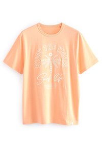 T-shirt orange clair à manches courtes avec un graphisme de palmier blanc et les textes "Enjoy the waves" et "Surf up" sur le devant.